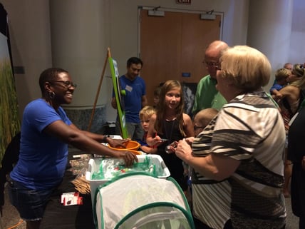 Sinnika talks with visitors to the AgBiome booth at the 2017 BugFest event at the Museum of Natural Sciences in Raleigh, NC. 
